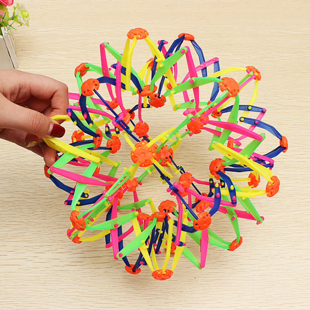 Rainbow Expandable Ball Toy. Shop Activity Toys on Mounteen. Worldwide shipping available.